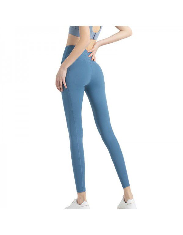 High waist pocket fitness pants for women in Europe and America cross-border double-sided nylon stretch sports tights Honey peach hip yoga pants 