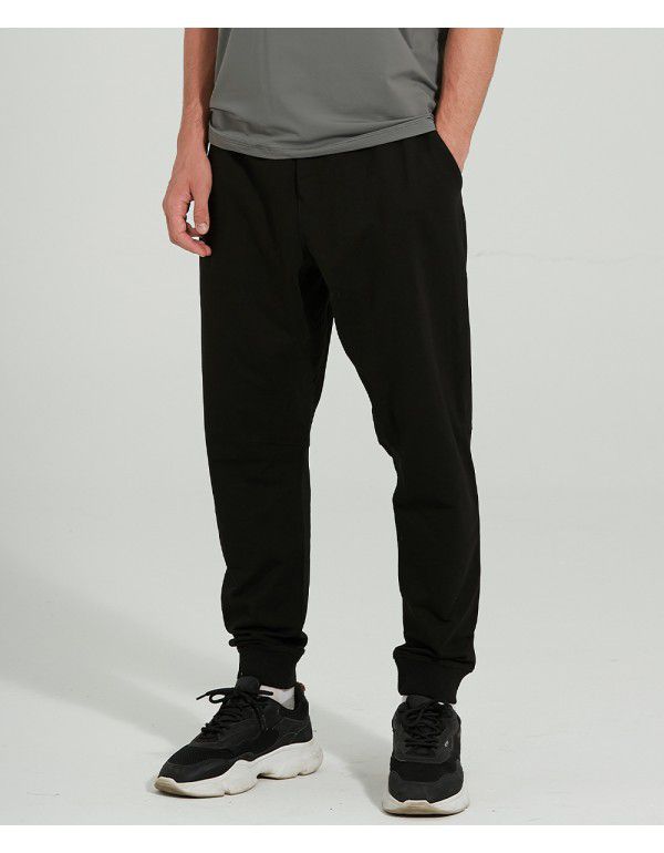 Sports pants with straight elastic waist and loose...